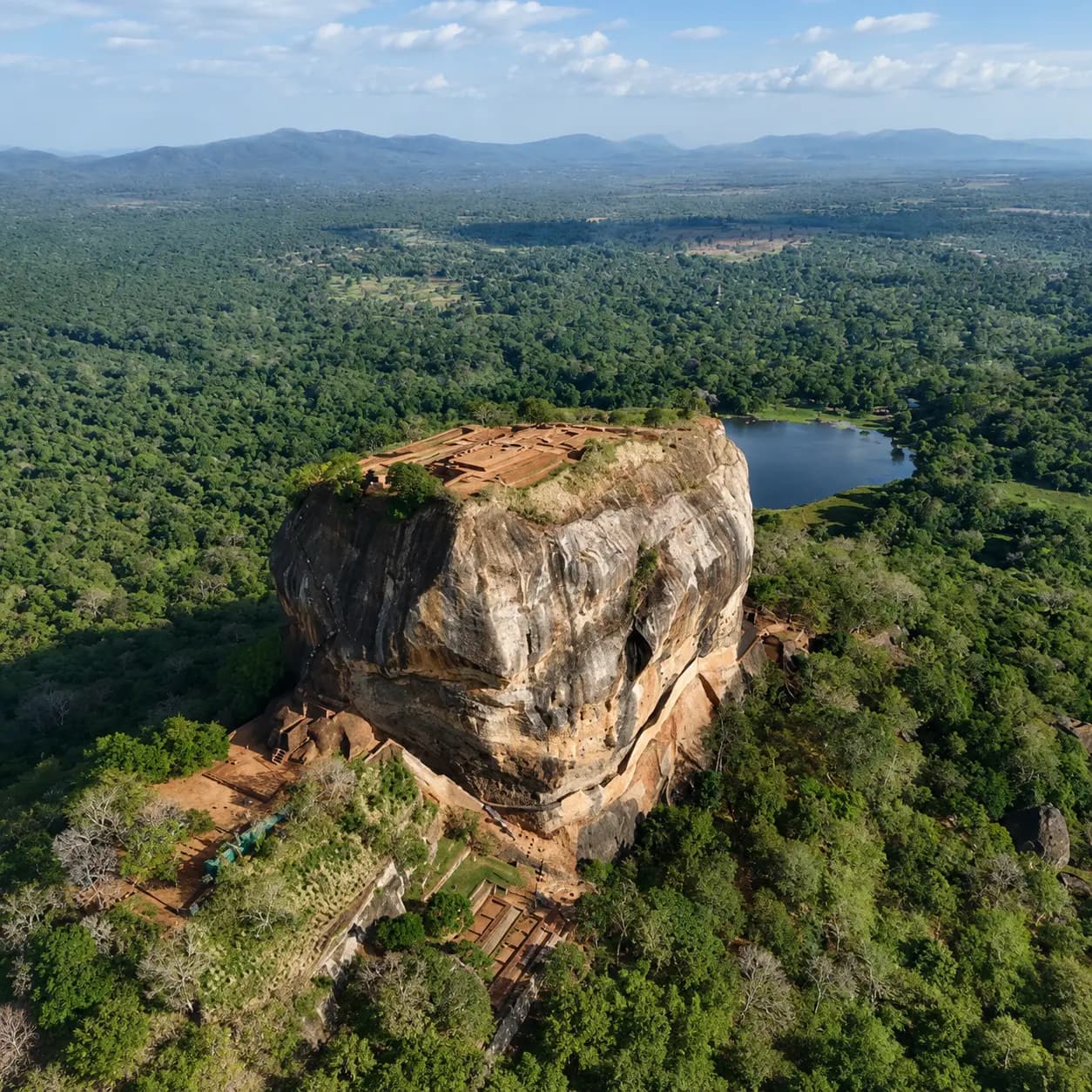 Sigiriya rock fortress rising above the plains — one of the routes our guides know by heart