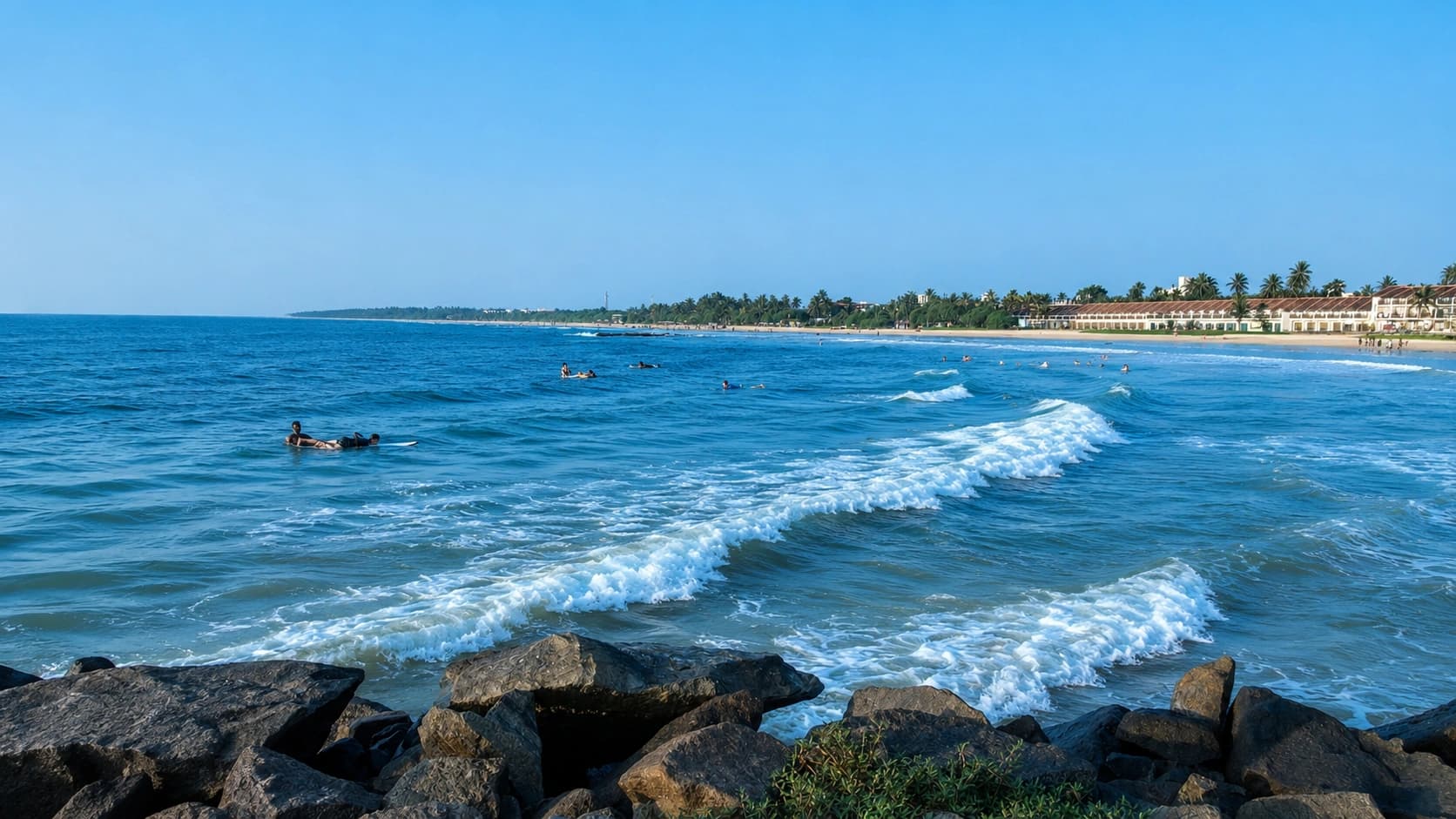 Golden beach and palm trees at Bentota, Sri Lanka
