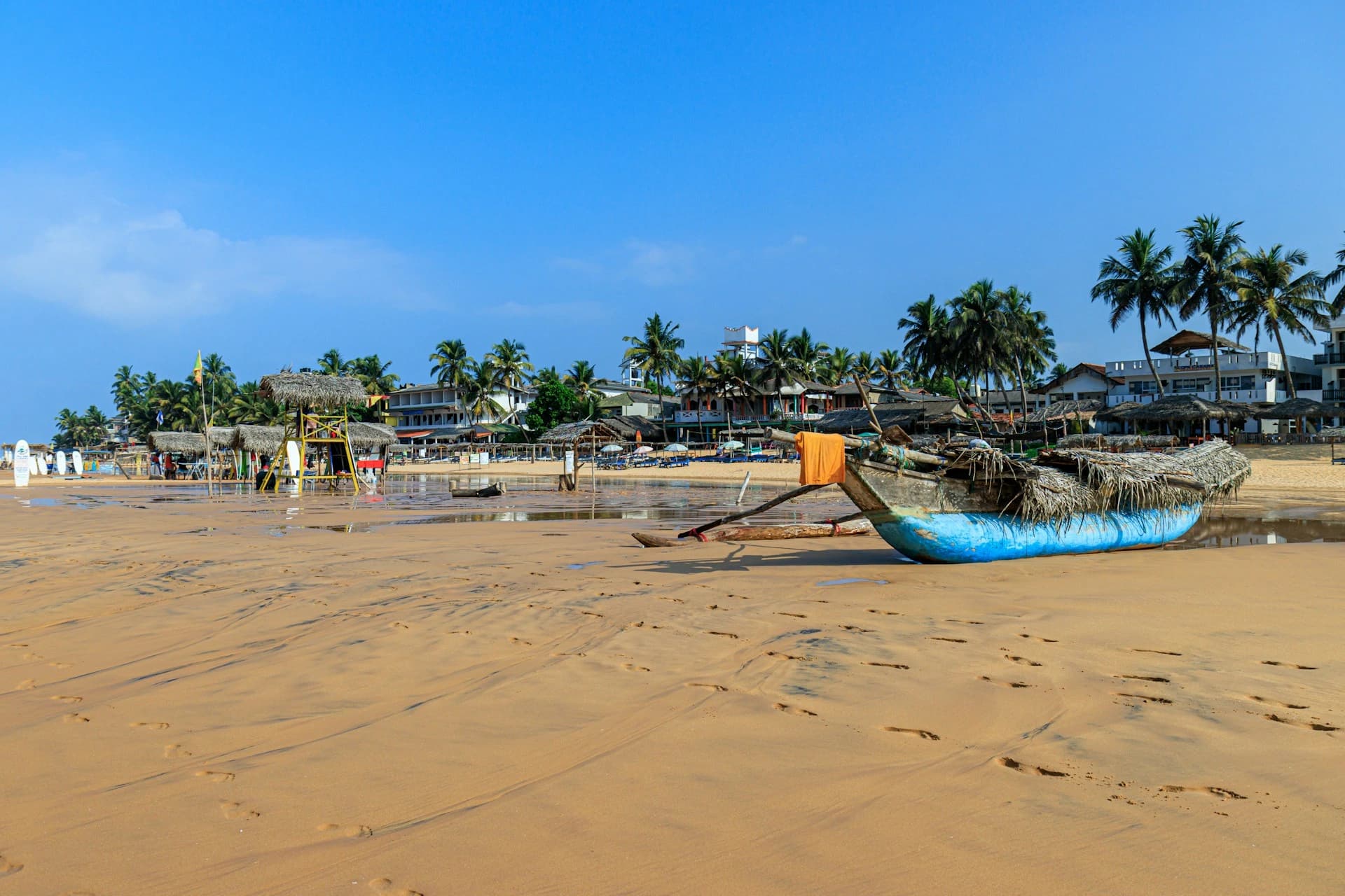 Beach and coral reef water at Hikkaduwa, Sri Lanka