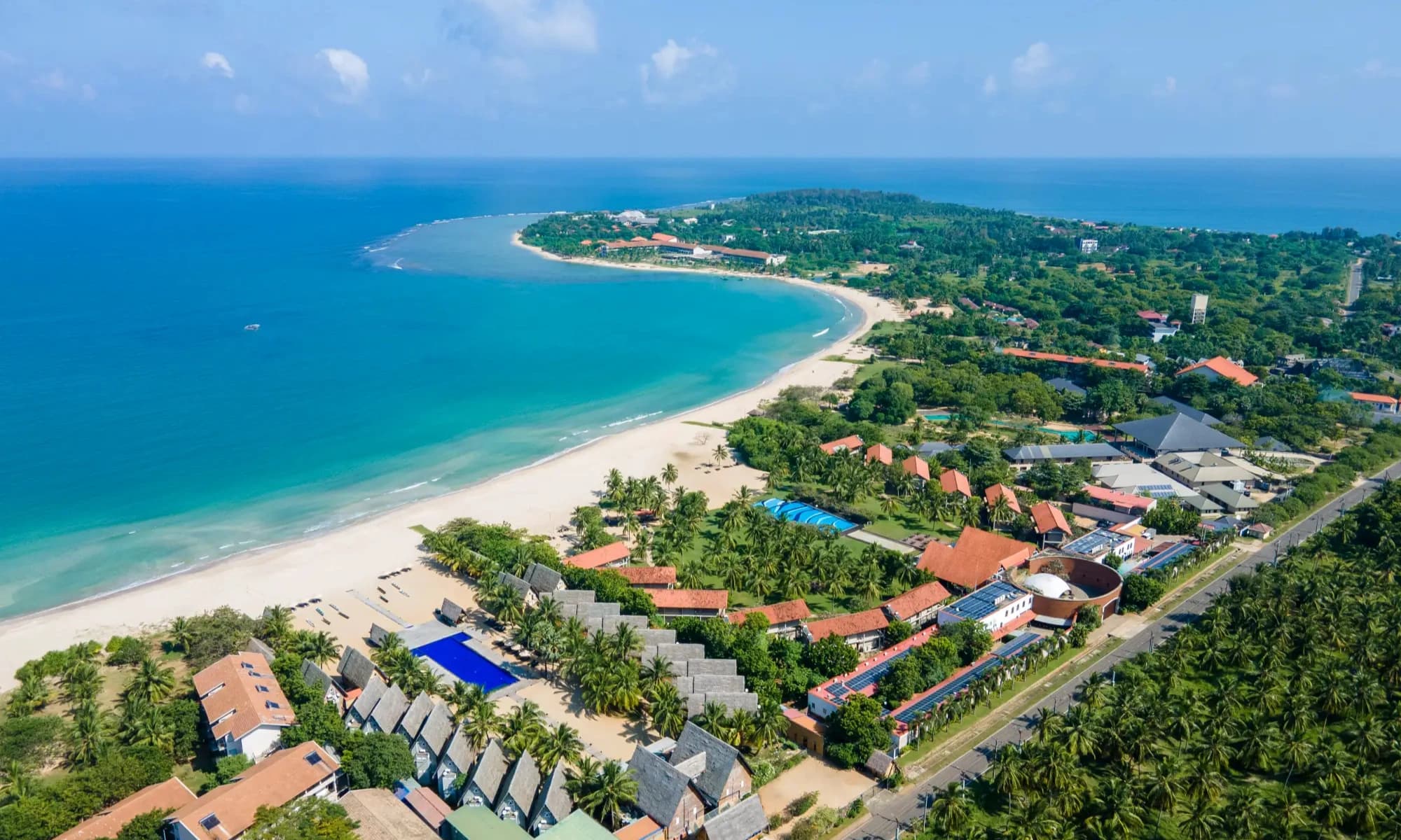 Long shallow calm bay with resorts at Pasikuda, Sri Lanka