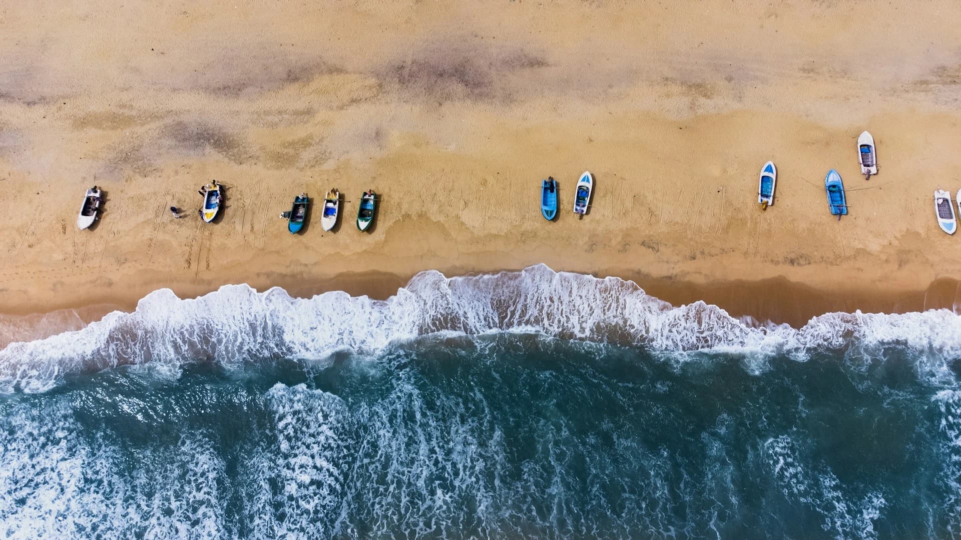 Surfer riding a wave at Arugam Bay on Sri Lanka's east coast